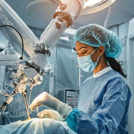 Firefly A robotic surgical arm carefully manipulates delicate instruments inside a patients body du